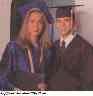 Brian and Samantha in their cap and gowns graduating HS